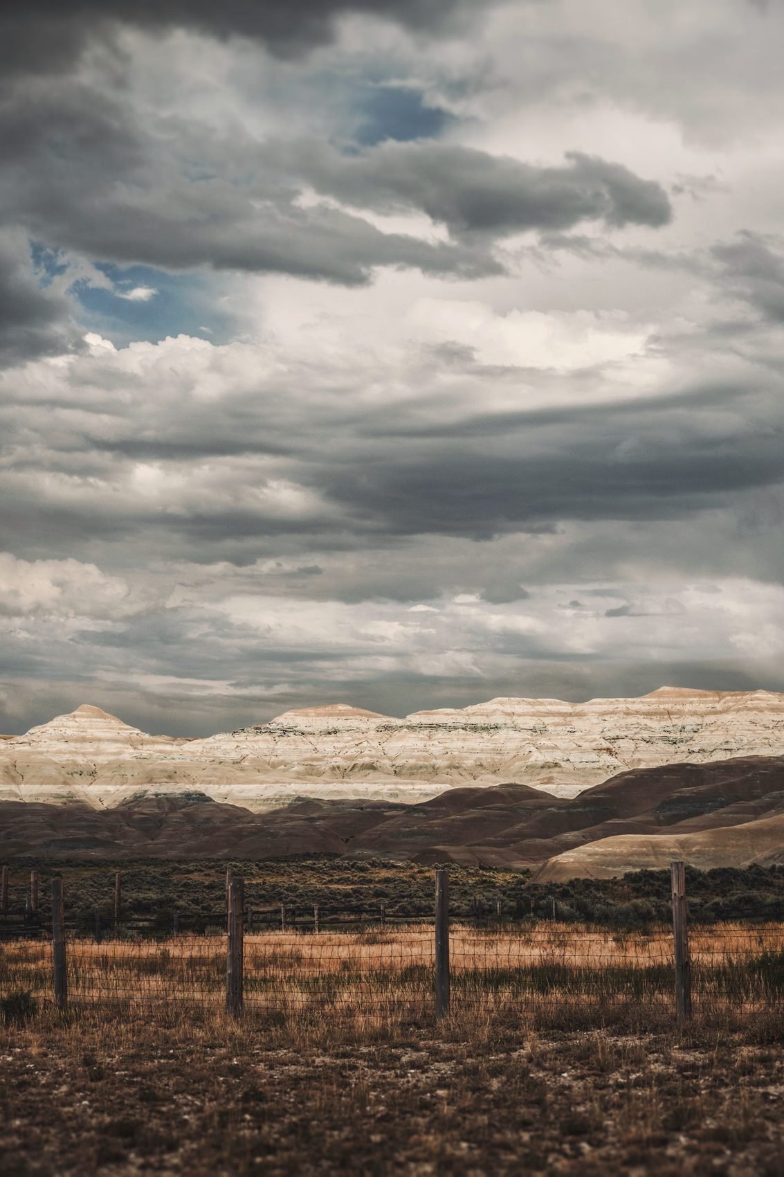 Heavy clouds over an empty grassland horizon